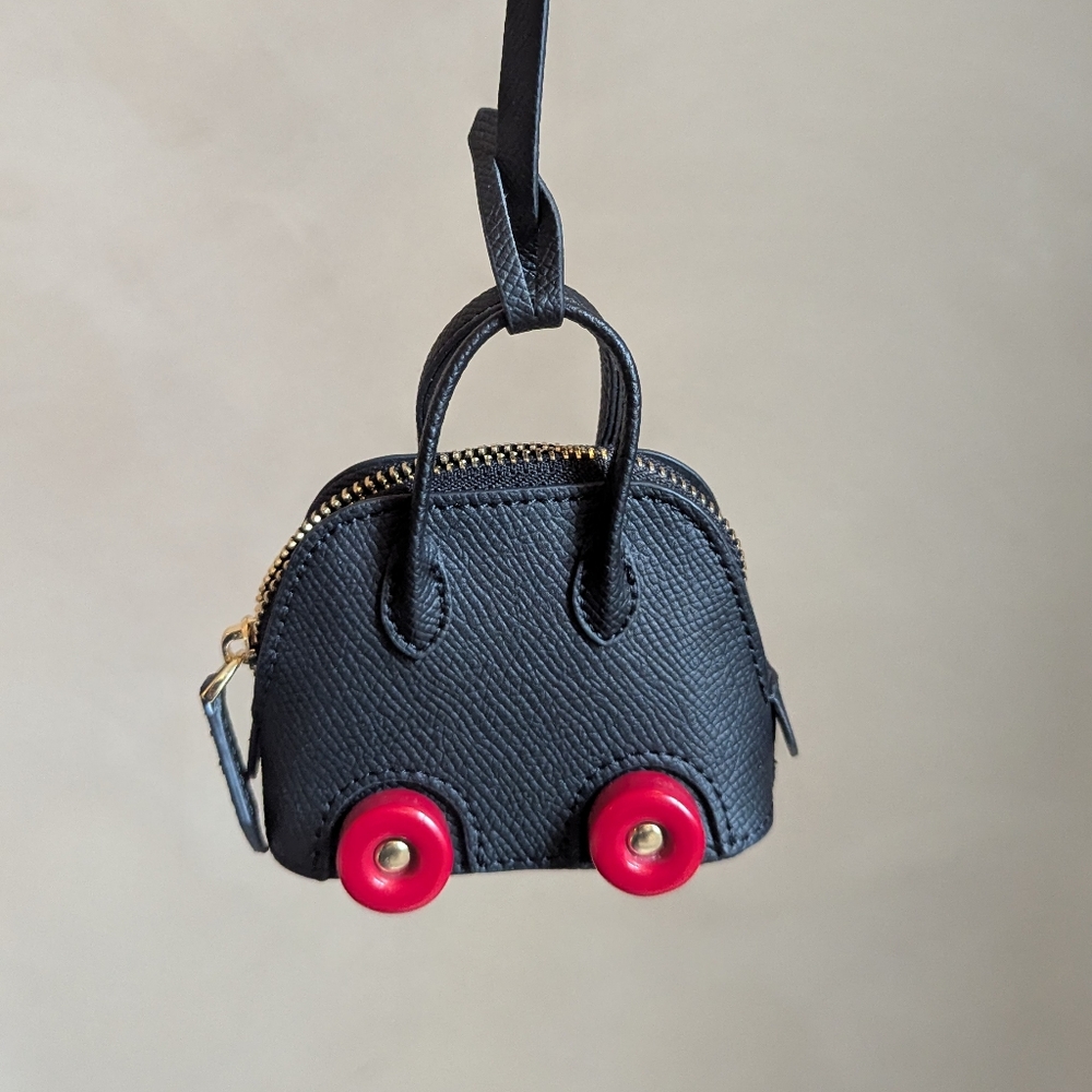Bag Charm Black Mini Bolide Bag with Red Wheels